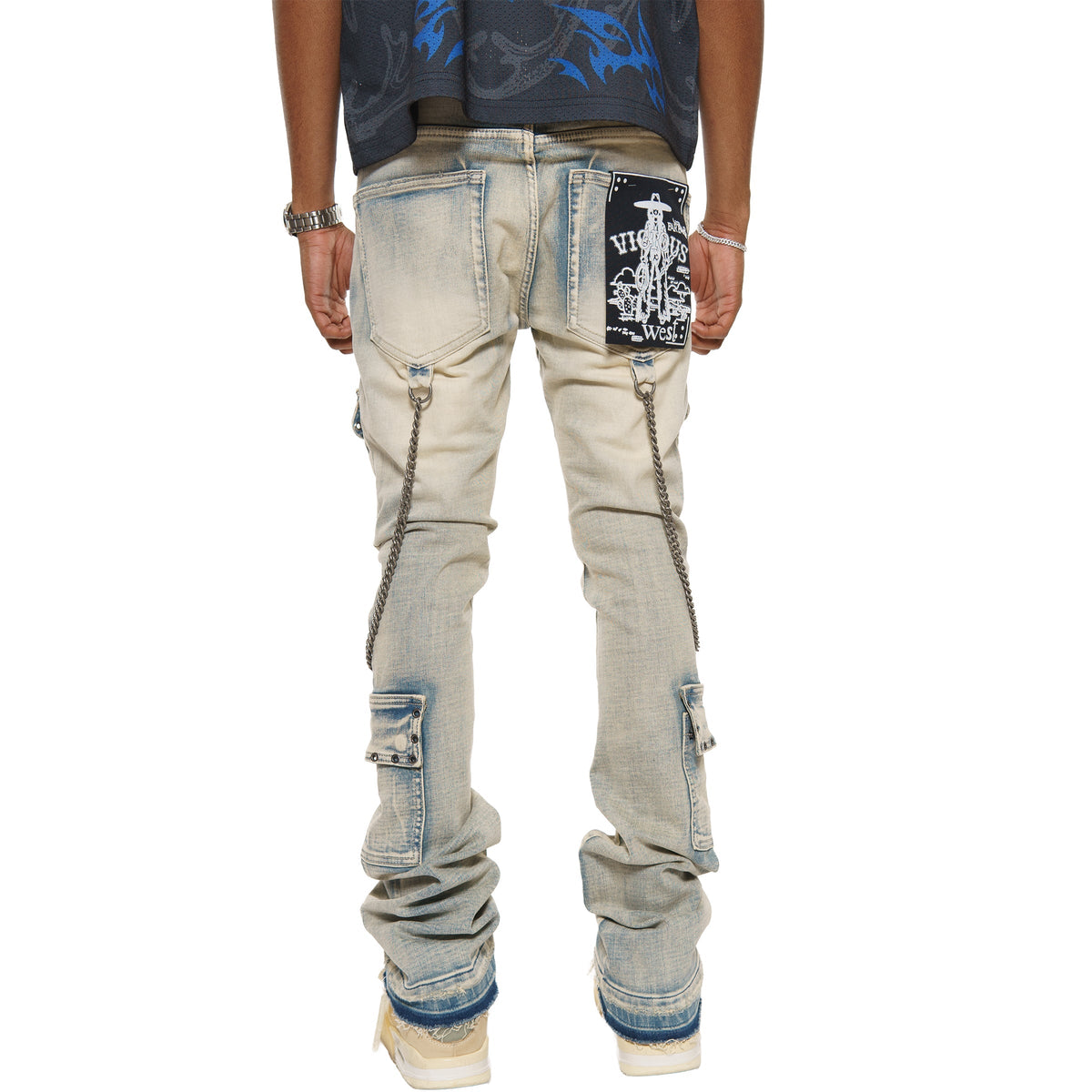 Flare fit denim pant w/ stone details + chains